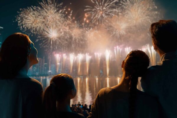 Happy loving family watching fireworks.