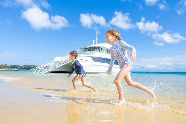 kids enjoying the beach